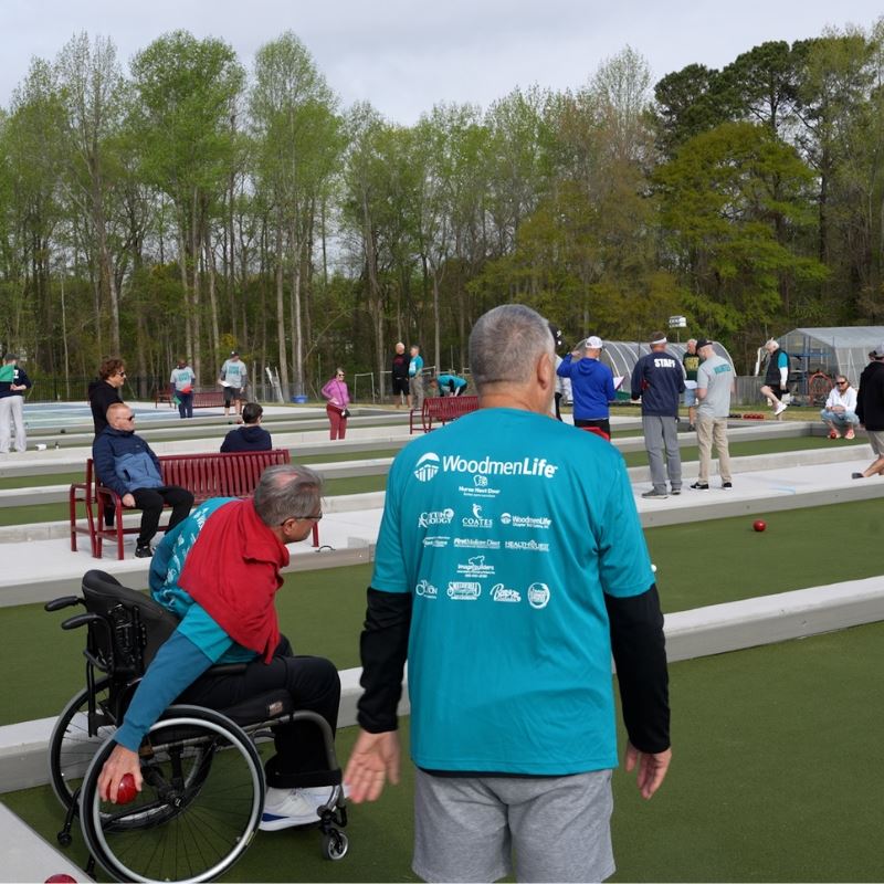 seniors play bocce ball at Clayton Community Center