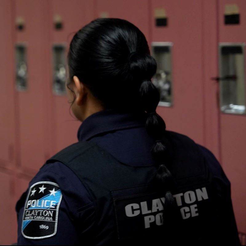 School Resource Officer Avigail Cruz Walk Clayton Middle School Hallway