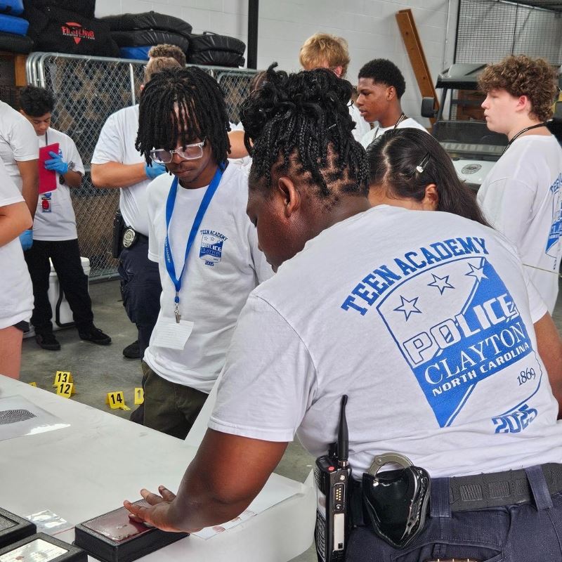 Clayton officer explains information about evidence at the Teen Acadademy